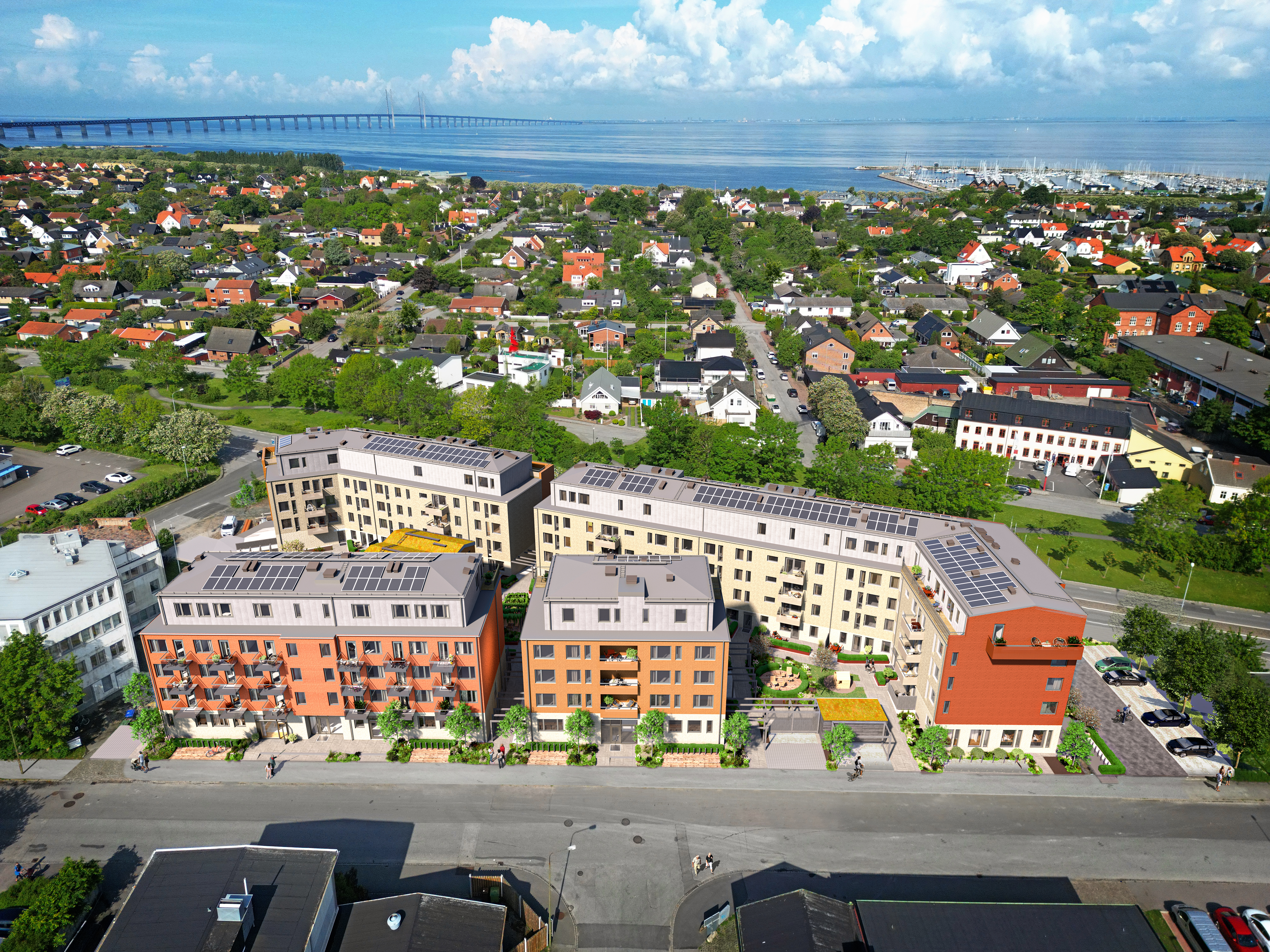 En drönarbild över området Limhamn med Öresundsbron i bakgrunden. 